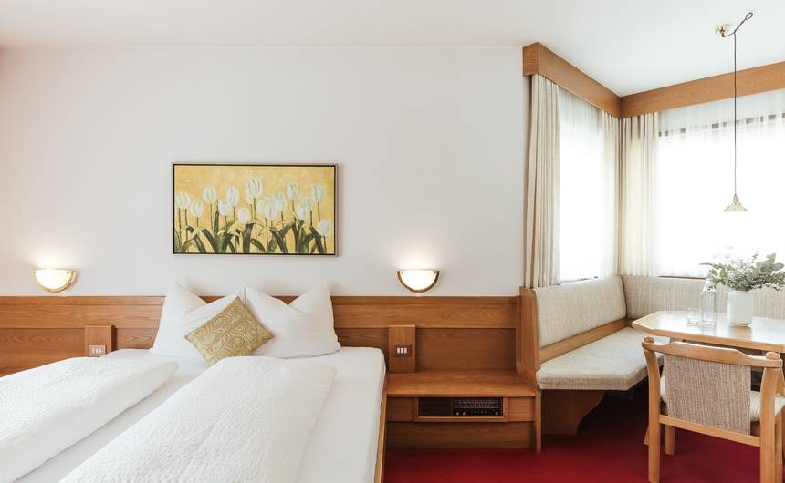Modern double room "Hasenöhrl" at Hotel Bauhof, cozy alpine design with wooden furnishings and mountain view